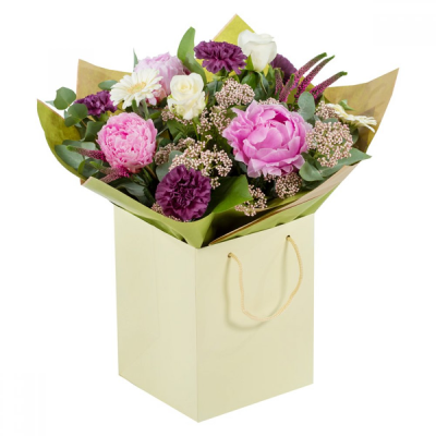 Country Whispers - A sweetly scented hand-tied featuring Peonies with a fine company of beautifully selected flowers. Make their day with a one-of-a-kind arrangement that promises to deliver.    